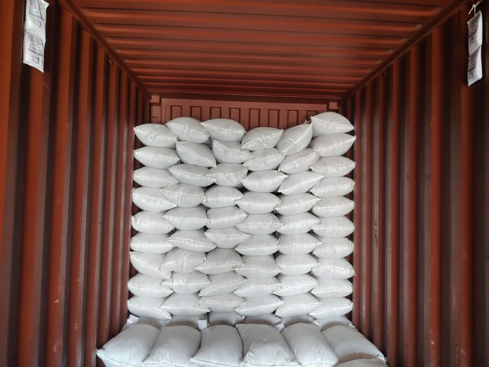 Stacked cartons of Herbs Gate spices ready for international shipping